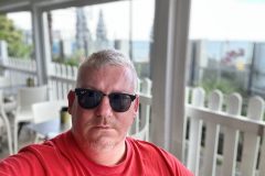 Portrait of Barrie Jarrett in Genoa Italy by the beach